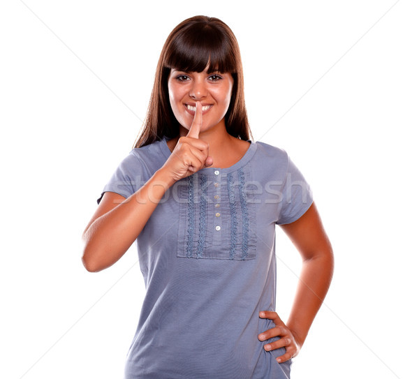 Charming young woman requesting silence Stock photo © pablocalvog