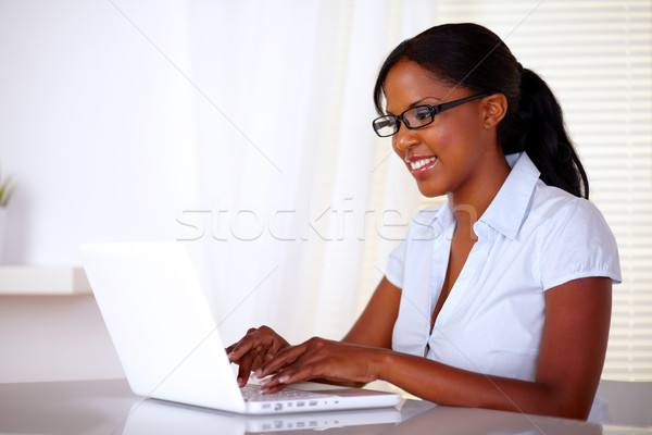 Atrakcyjna kobieta pracy laptop czarny okulary pracy Zdjęcia stock © pablocalvog