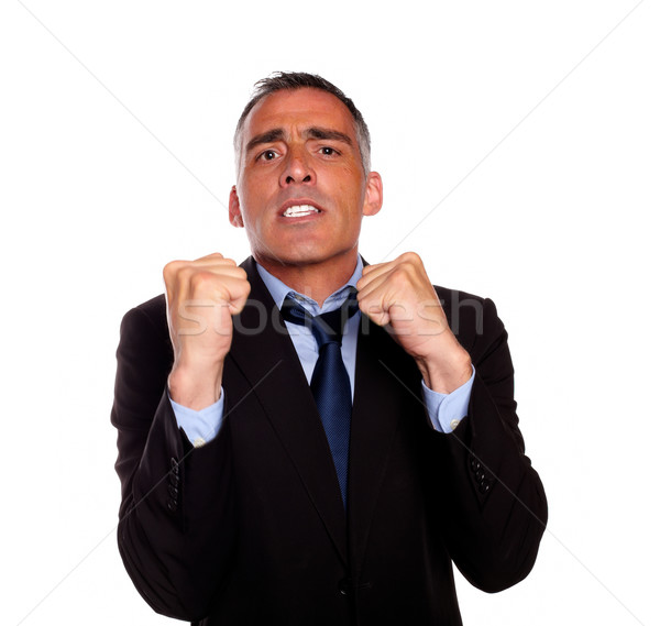 Business man with clenched fists Stock photo © pablocalvog