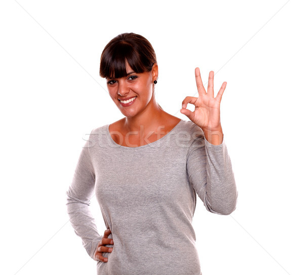 Young woman saying great job with her hand Stock photo © pablocalvog
