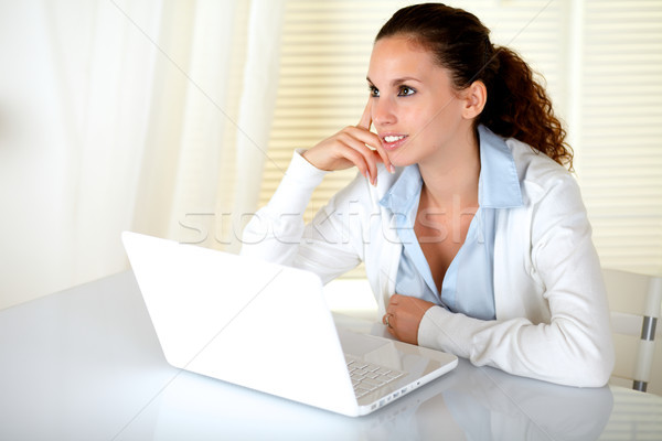 Zamyślony młoda kobieta laptop biuro domu przestrzeni Zdjęcia stock © pablocalvog