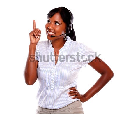 Vriendelijk jonge receptionist hoofdtelefoon hoofdtelefoon Stockfoto © pablocalvog