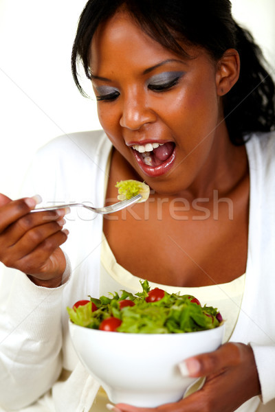 Vegetarian woman eating a attractive green salad Stock photo © pablocalvog