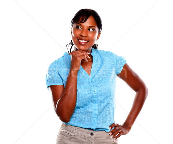 Stylish young black woman smiling on blue shirt Stock photo © pablocalvog