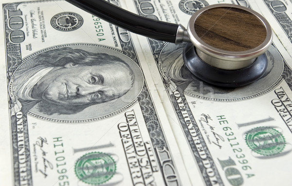 Stethoscope on money Stock photo © Pakhnyushchyy