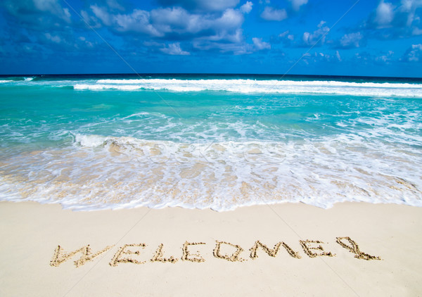 welcome written in beach Stock photo © Pakhnyushchyy