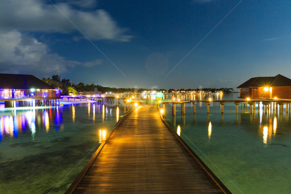 Foto stock: Puesta · de · sol · mar · playa · casa · océano · viaje