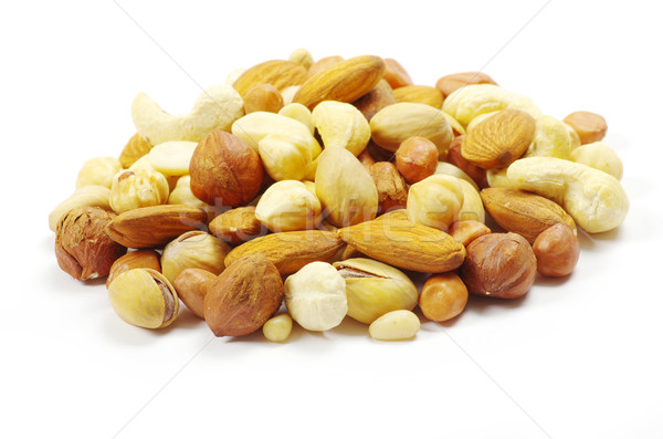  nuts on white  Stock photo © Pakhnyushchyy