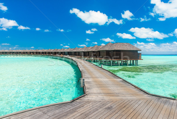  beach with water bungalows Maldives Stock photo © Pakhnyushchyy