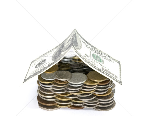 Dinero casa monedas dólar casa Foto stock © Pakhnyushchyy