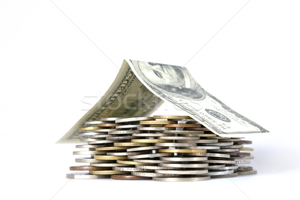 Pénz ház érmék dollár bankjegy otthon Stock fotó © Pakhnyushchyy