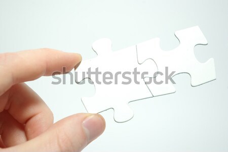 Puzzle darab kéz tart építkezés munka Stock fotó © Pakhnyushchyy