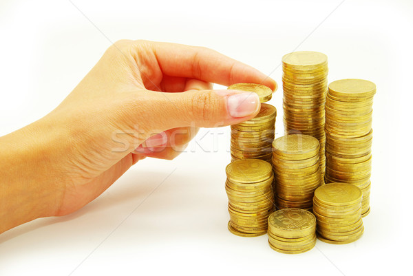 Monede mână monedă bani scara izolat Imagine de stoc © Pakhnyushchyy