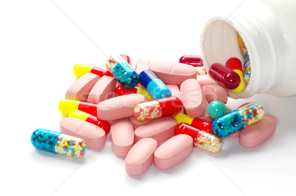 Pílulas isolado branco textura fundo medicina Foto stock © Pakhnyushchyy