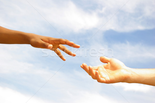 Helpende hand hemel handdruk pad zorg menselijke Stockfoto © Pakhnyushchyy