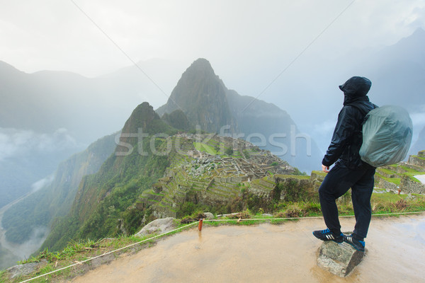 Tourist looking over Machu Picchu, Peru Stock photo © Pakhnyushchyy