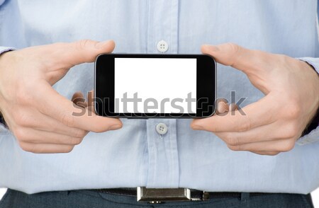 Mobil kezek tart izolált fehér telefon Stock fotó © Pakhnyushchyy