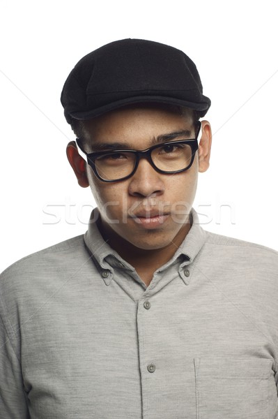 Asian malay man looking at you with firm stare on white background Stock photo © palangsi