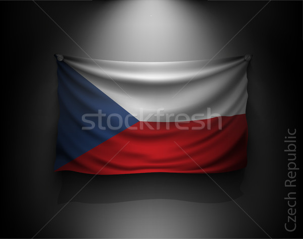 waving flag on a dark wall with a spotlight, illuminated Stock photo © Panaceadoll