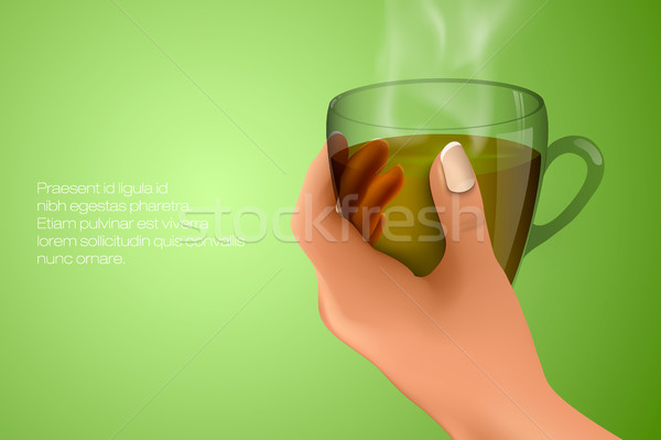 hand holding a cup of hot tea Stock photo © Panaceadoll