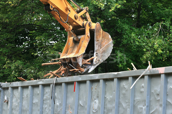 excavator bucket dumping Stock photo © pancaketom