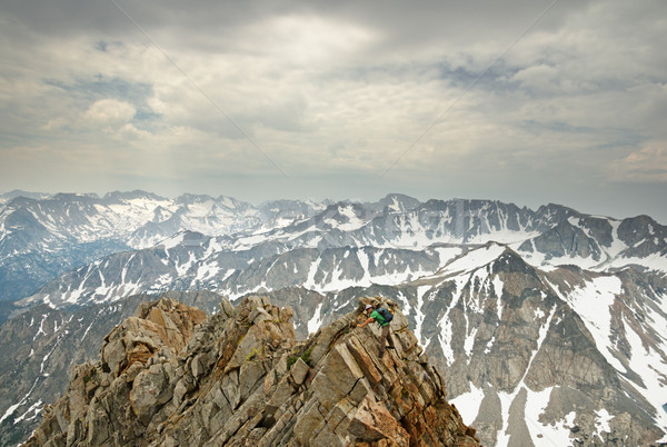 Man Climbing Mountain Ridge Stock photo © pancaketom