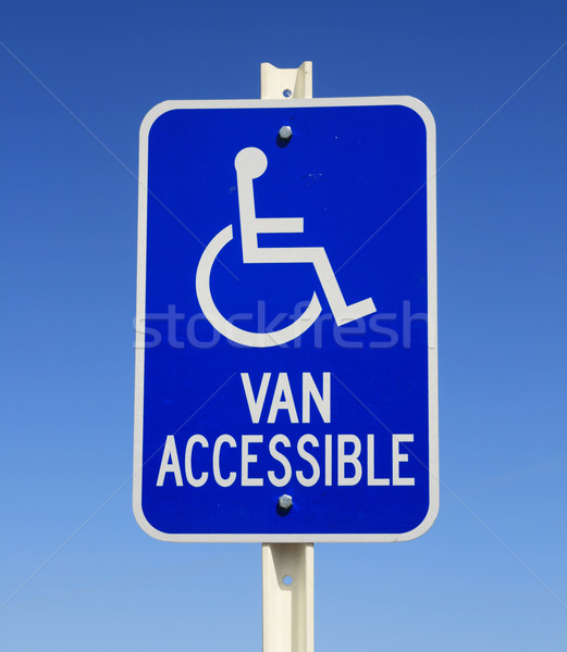 Behindert van Parkplatz Zeichen blau weiß Stock foto © pancaketom