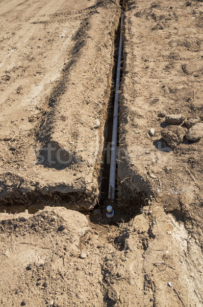 Irrigazione installazione pvc tubi suolo campo Foto d'archivio © pancaketom