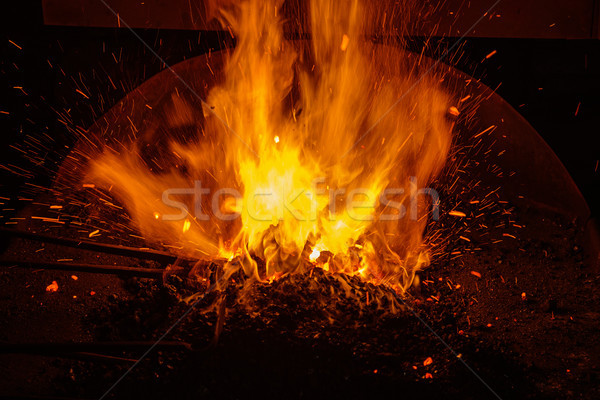 Demirci sıcak yanan yangın duman Stok fotoğraf © pancaketom