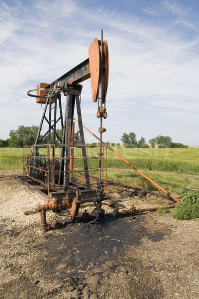 Poço de petróleo bombear laranja preto enferrujado campo Foto stock © pancaketom