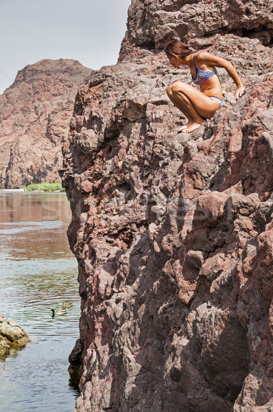 Kobieta posiedzenia powyżej rzeki bikini Colorado Zdjęcia stock © pancaketom