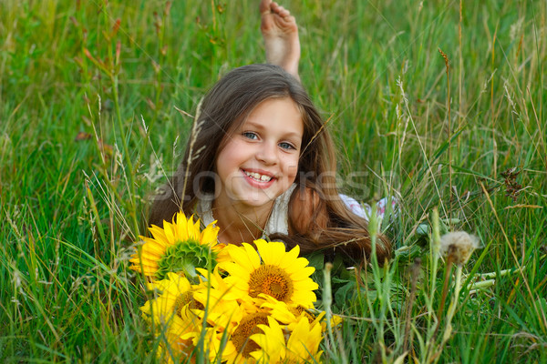 A little girl is in the field Stock photo © pandorabox