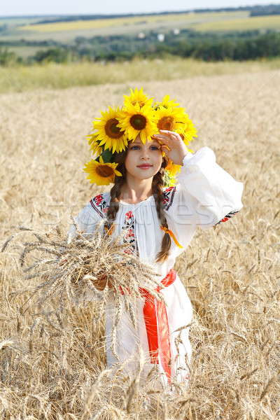 A photo of little beautiful girl is in vintag national clothes Stock photo © pandorabox