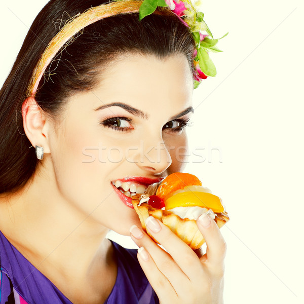 young, beautiful brunette with fruit cake isolated on white Stock photo © pandorabox