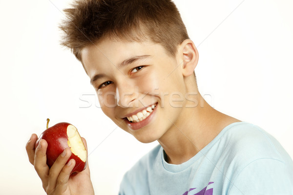 Ragazzo mangiare mela bianco sorriso felice Foto d'archivio © paolopagani