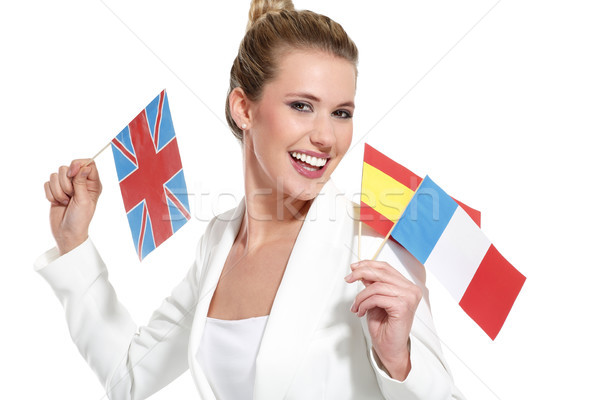 beautiful woman showing international flags Stock photo © paolopagani