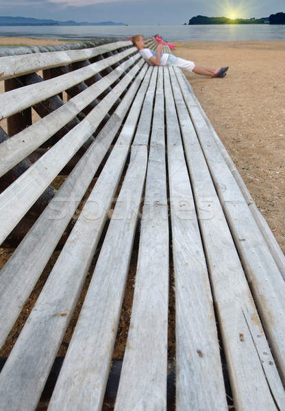 Bois chaises de plage personnes mer coucher du soleil ciel [[stock_photo]] © papa1266