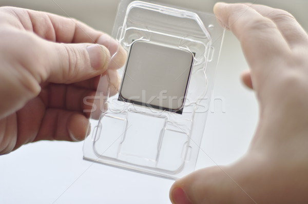 Male hands holding dual core CPU Stock photo © papa1266