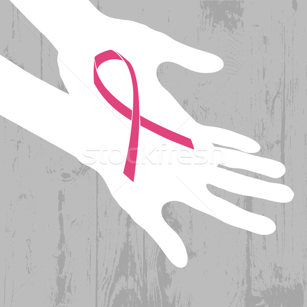 Ribbon of Breast Cancer on abstract wooden background. Stock photo © pashabo