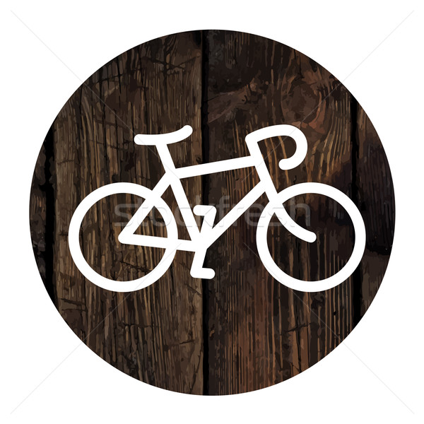 Bicycle minimalistic icon on aged wooden wall background Stock photo © pashabo