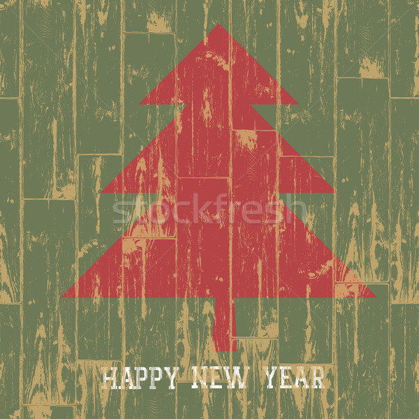 New year tree symbol with greetings on wooden planks texture. Ve Stock photo © pashabo