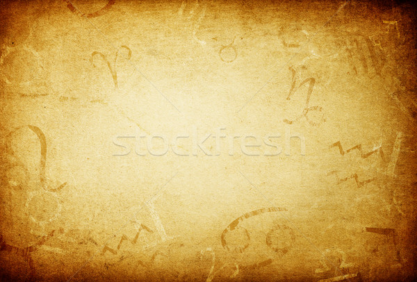 Texture of old paper with zodiac signs, abstract astrology theme Stock photo © pashabo