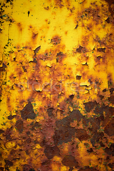 Stock photo: Worn and weathered crusted chipped paint on textured metal