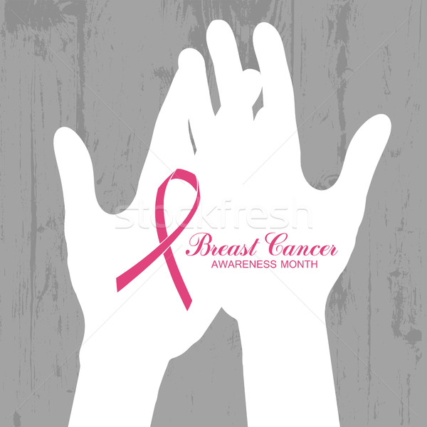 Ribbon of Breast Cancer on abstract wooden background. Stock photo © pashabo
