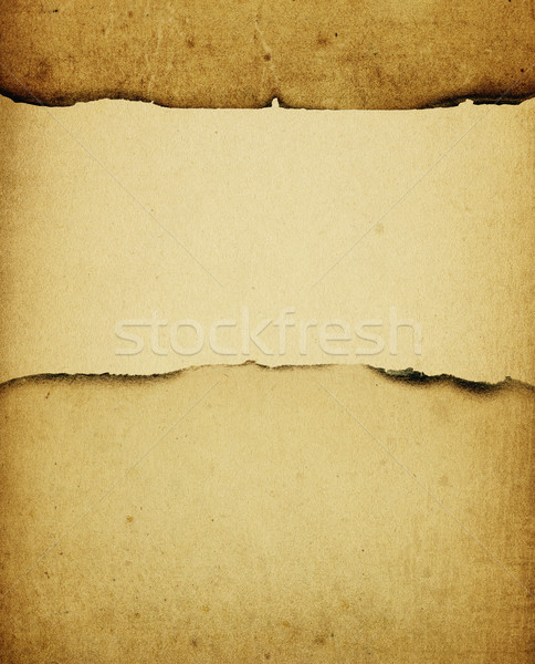 Vintage burned paper background, with space for text. Stock photo © pashabo