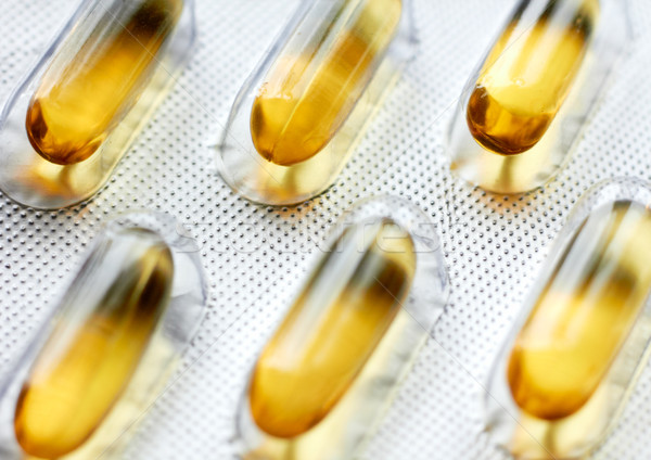 Yellow Pills. Horizontal orientation. Stock photo © pashabo