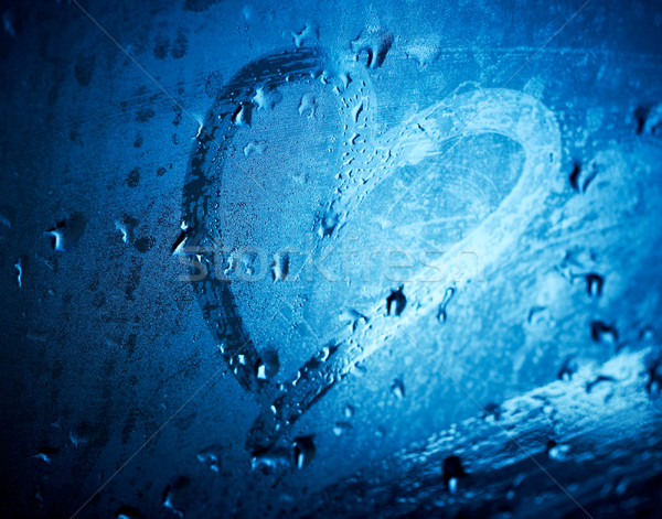 Heart drawn on wet glass. Shallow DOF. Stock photo © pashabo