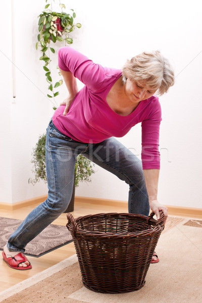 Senior Rückenschmerzen schwierig einlegen weiblichen Frauen Stock foto © Pasiphae