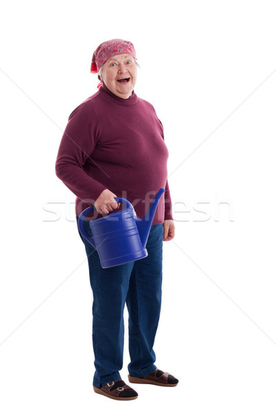 Senior holding a watering can Stock photo © Pasiphae