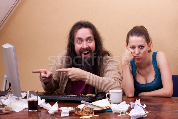 Nerd is enthusiastic to monitor wife is bored Stock photo © Pasiphae
